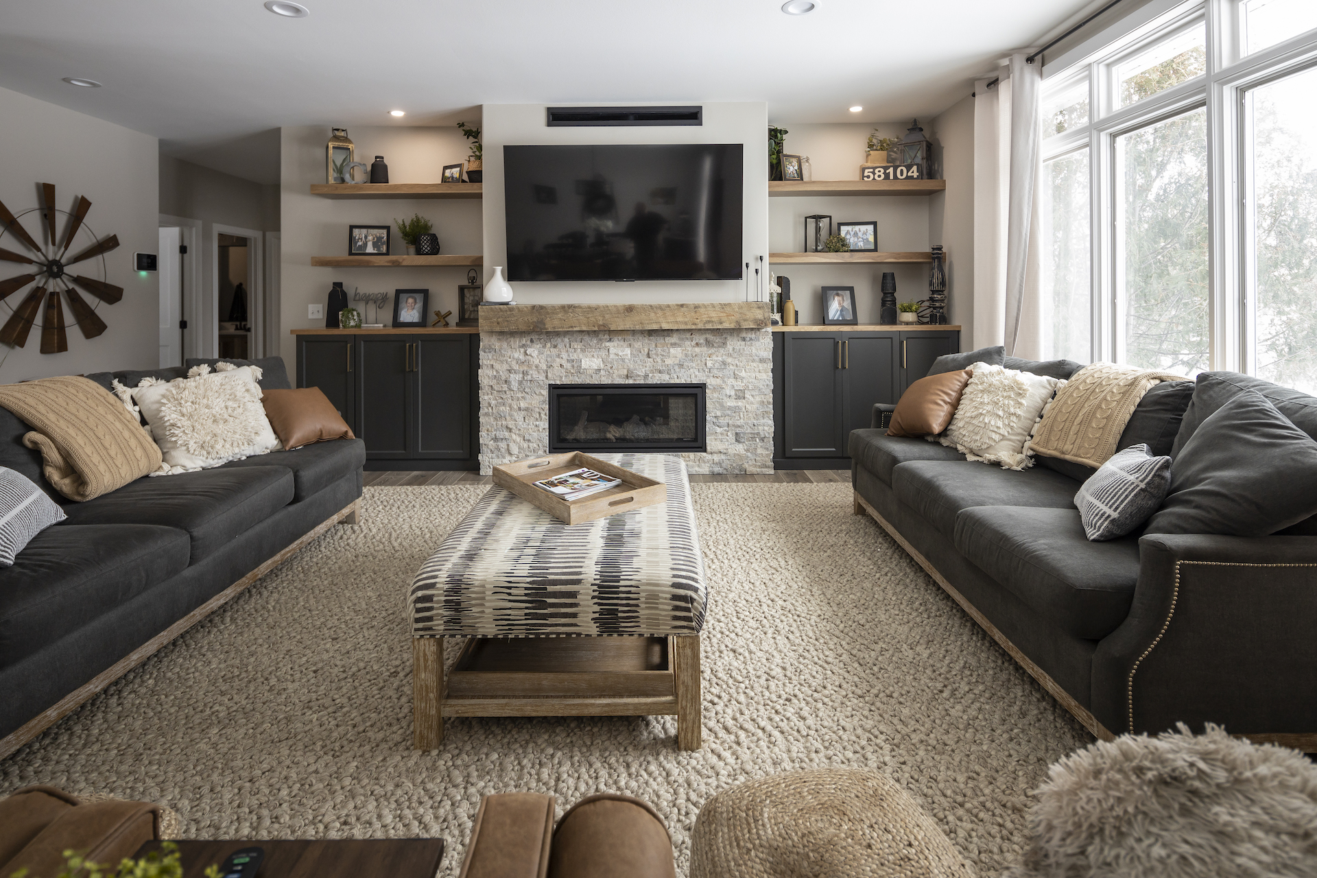 living room interior design with couches and shelves